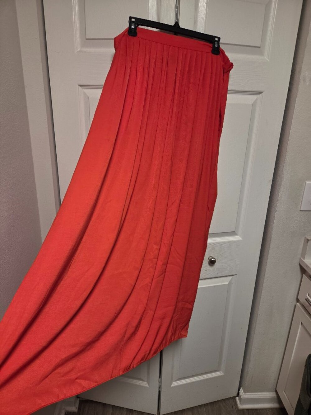 Long red skirt .